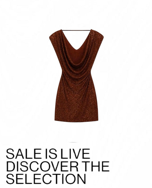 Abito corto con paillettes scollato sul davanti e sul dietro